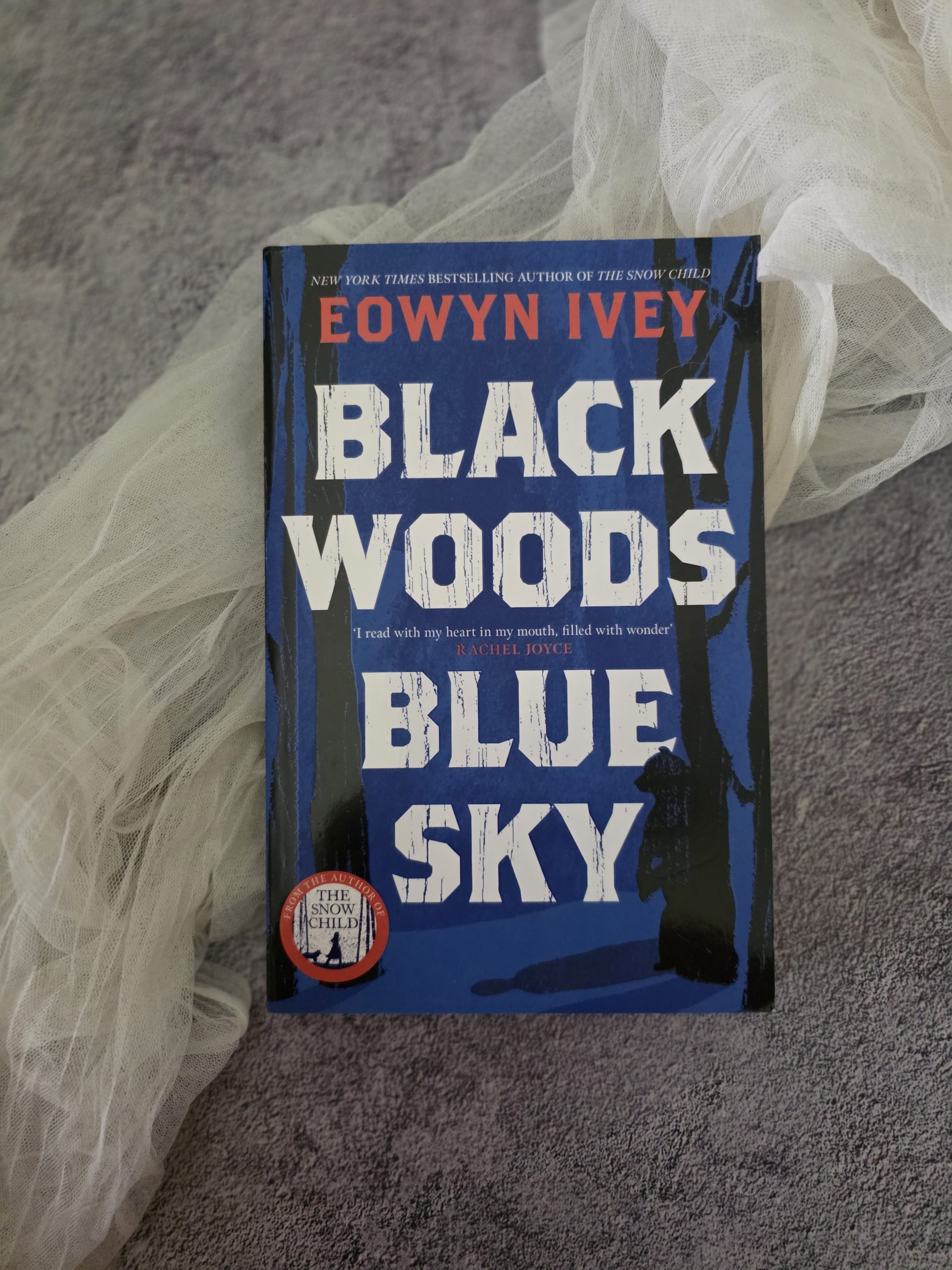 Black Woods Blue Sky by Eowyn Ivey